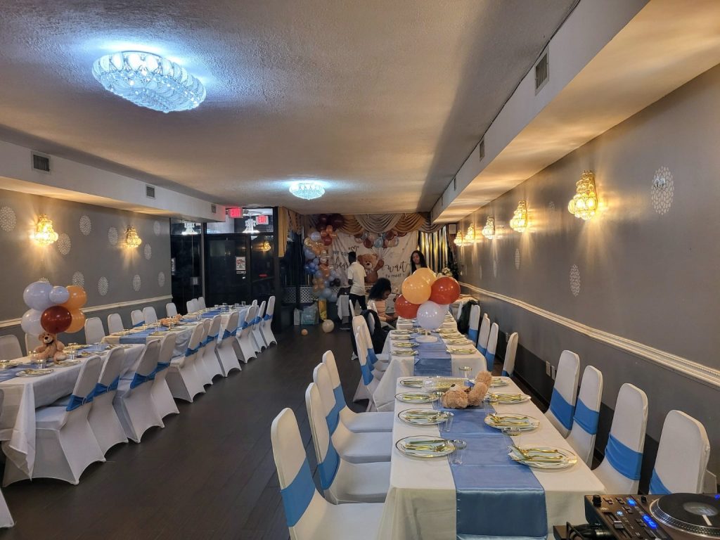 Baby shower venue in Queens NY with elegant blue table setup at Skylight Hall